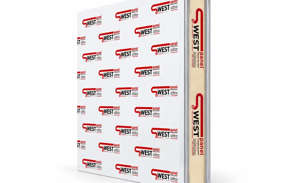 The panel edge reveals the insulating core between the two steel skins — and it is where the locking system sits.